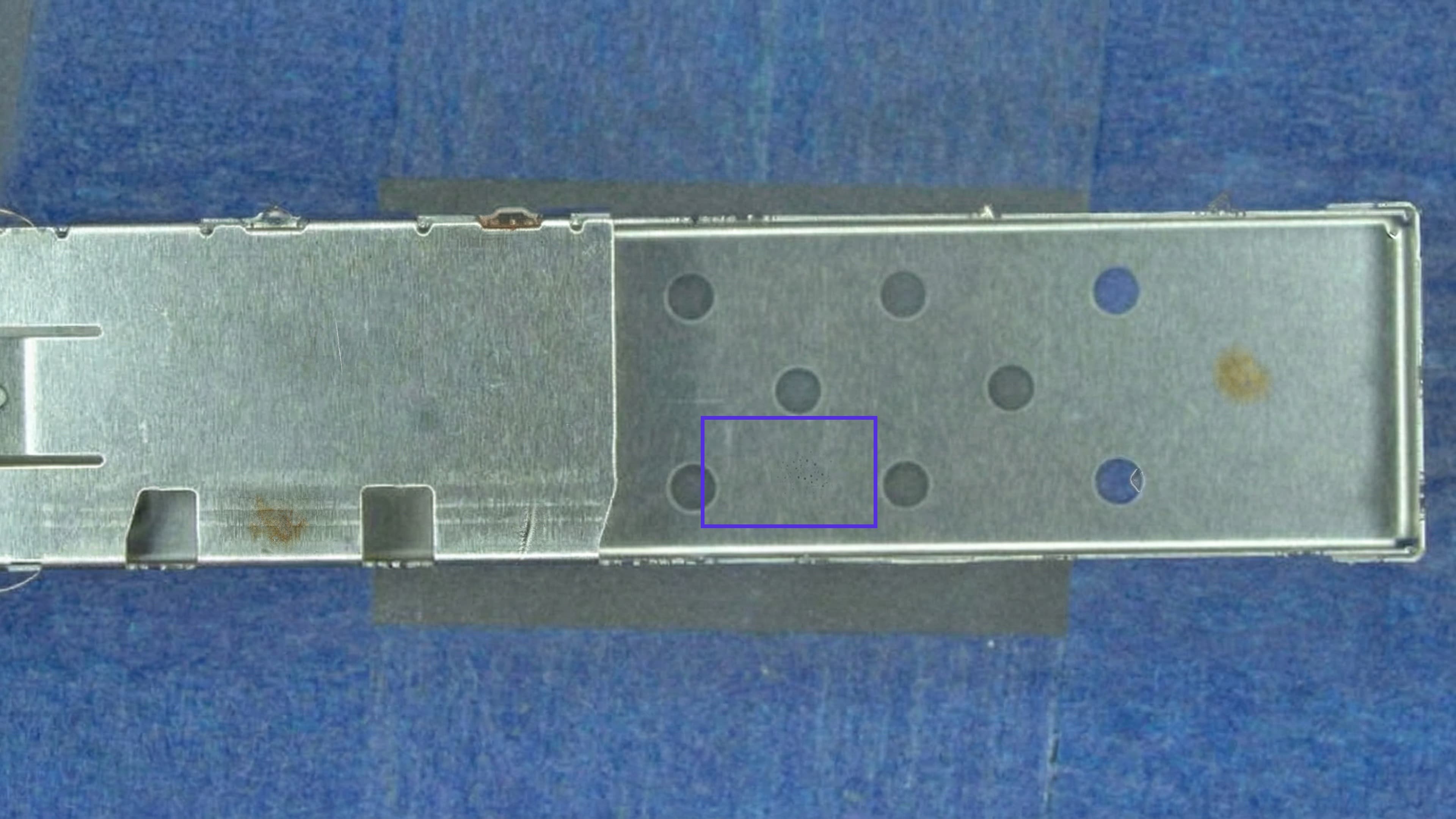 Eight synthetic defect classes authored on one connector reference image