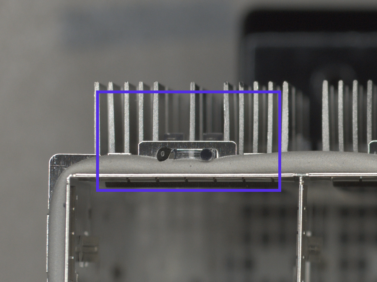 Synthetic dent on a 4-cavity stacked connector