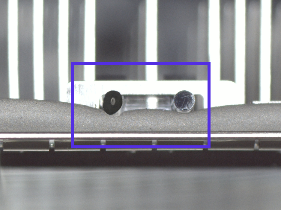 Synthetic dent on a long rail-style connector housing