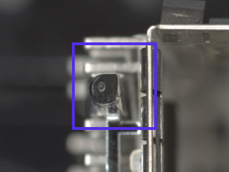 Synthetic dent close-up on an SFP cage detail