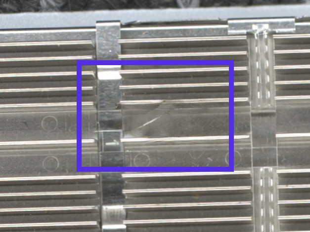 Synthetic scratch on a stacked fin housing connector